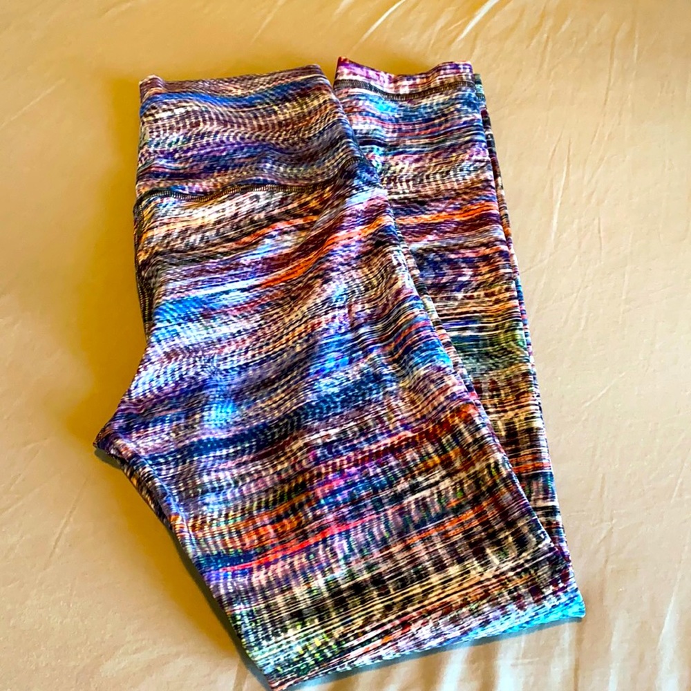 Never been worn multicolor Lululemon Wunder Under leggings.